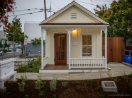 The charm of the historic Shotgun House is evident, even before it is ensconced in greenery.